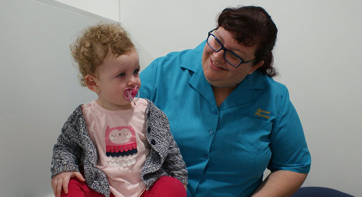 Registered Nurse, Megan Willis (R) with one of her first clinic clients, baby Aisha (L). Photo supplied