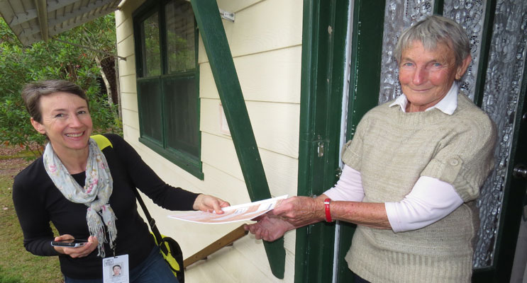 A local Field Officer delivers a Census form to Carol Tattersall. 