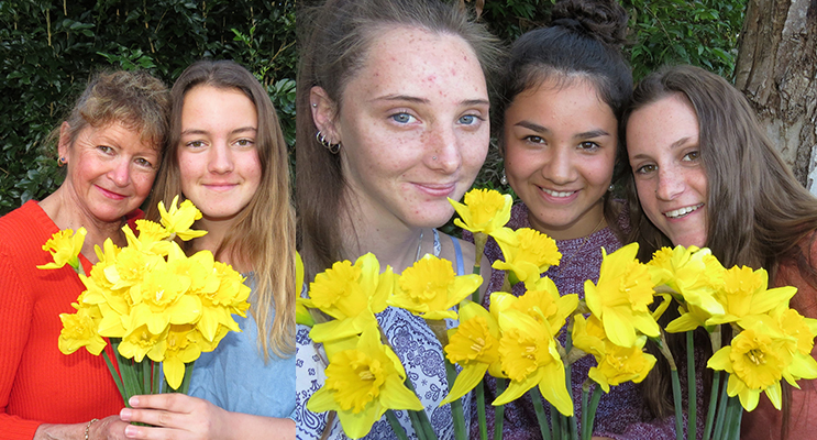 DAFFODIL DAY: Cancer survivor Debbie Smart and her daughter Kaitlyn.(left)SOMEONE I KNOW: Kaitlyn Osborne, Megan Markham and Marley Mezi support Daffodil Day for ( right) 