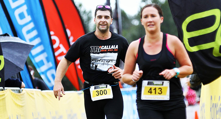 Luke Hodges and Hannah Ison approach the finish line at Nowra Triathlon, one of the 12 triathlon festivals that makes up Elite Energy’s Tri Series.