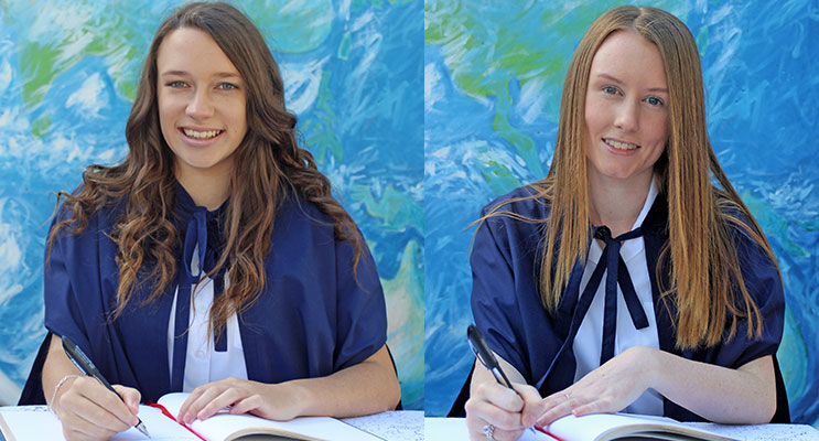 SIGN OUT: Chloe Lamborn signs the Graduation Book. (left) Emily Kirkpatrick signs the Graduation Book. (right)