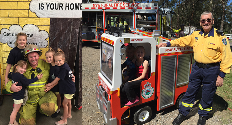 Deputy Captain Harrison Wright with Lexi, Lucy, Lyla and Avah outside the house fire smoke simulator.