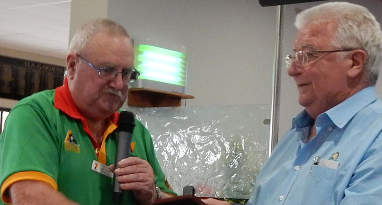 Peet-Ray Secretary/Chairman presenting a commemorative plaque to Country Club President Ken McKeown.