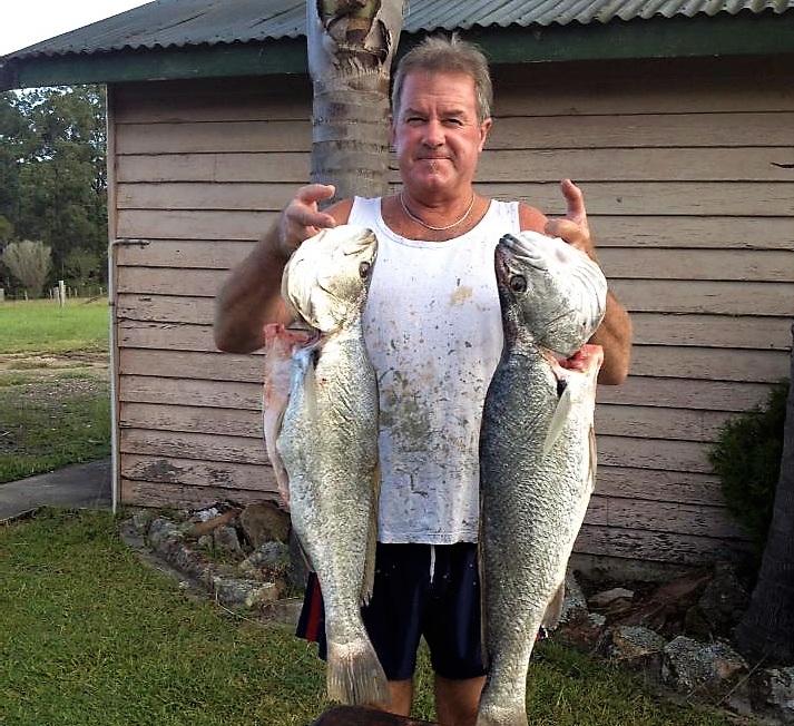 CATCH OF THE DAY: Brett Shultz with a couple of jewfish recently caught at the local beaches. 