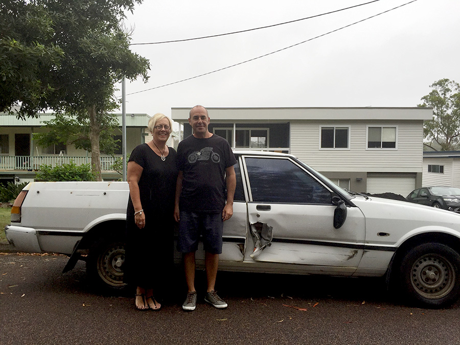 Bettina and Paul Brooke with their damaged vehicle.