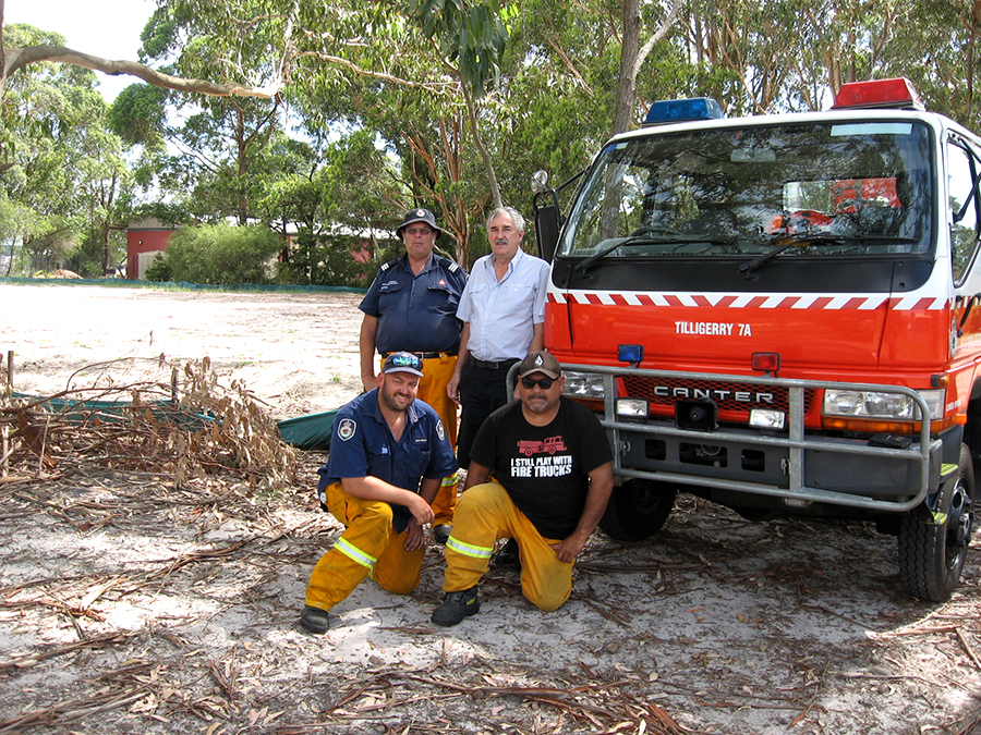 Tanilba Fire Captain George Brandenburg with Steve Tucker and fire crew at the new station site.