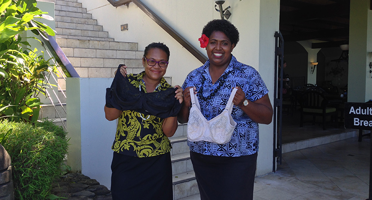 Staff of a hotel in Fiji receiving bras for women in their local area. Photo supplied by Donna Campton