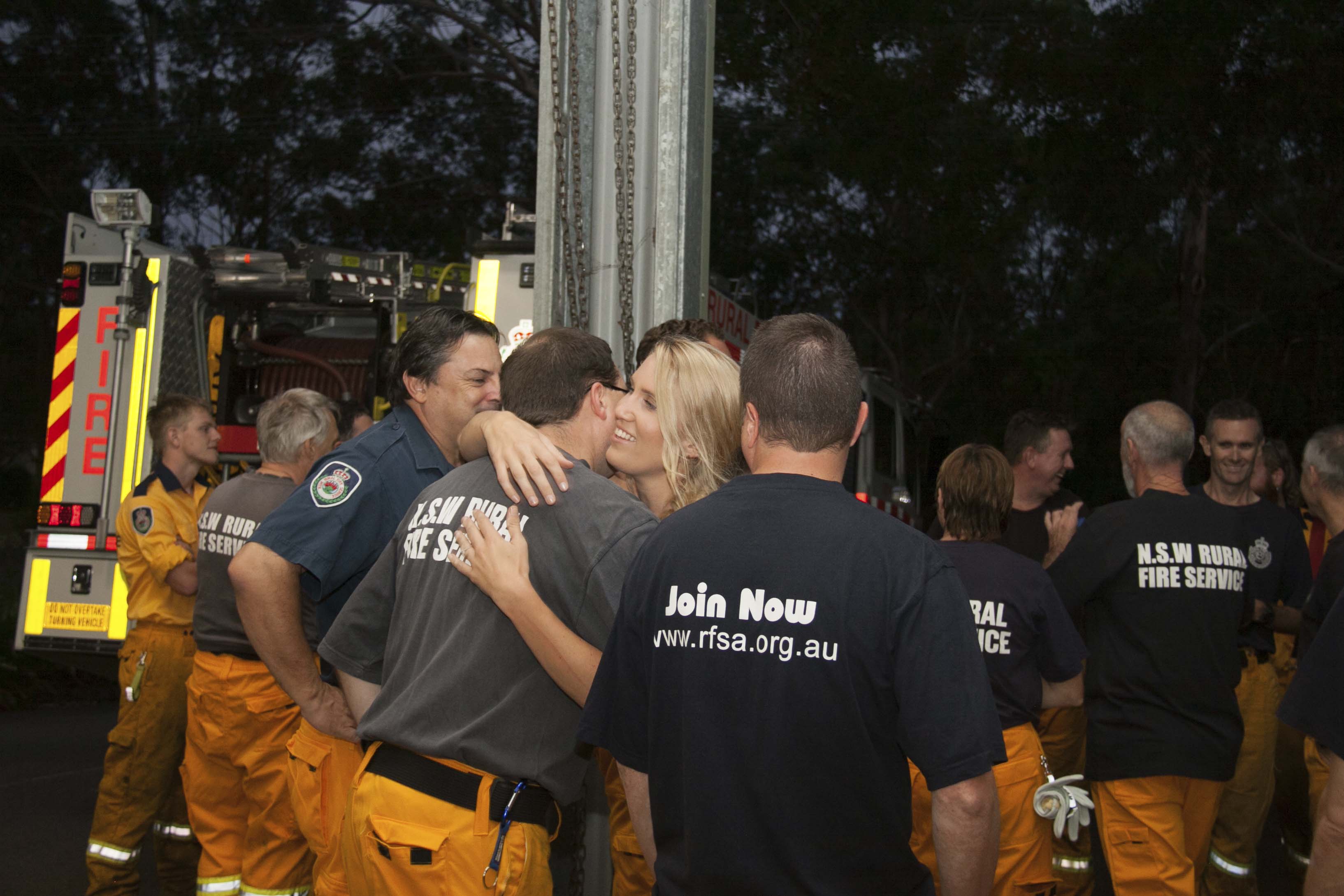 Congratulations hugs being given out by Medowie RFB members.