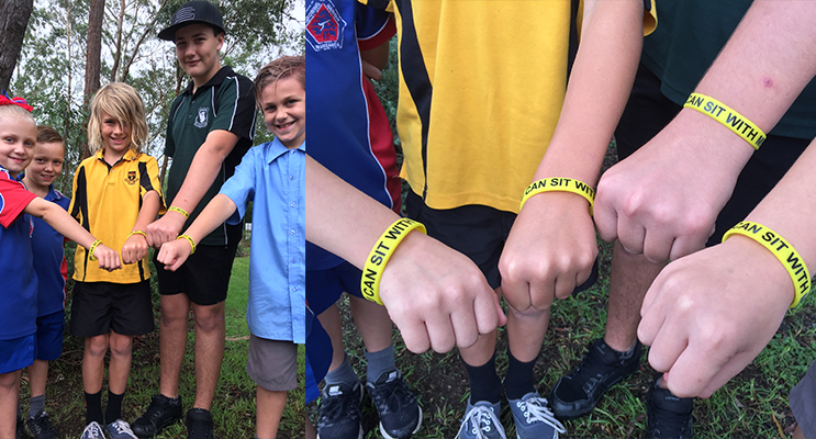 Medowie Schools standing together against bullying - Adryane and William Montgomery from Wirreanda PS, Oscar Smith from Medowie PS, Attila Worley-McGrath from Irrawang HS and Alexander Moore from Medowie Christian School.(left) Hands in, making a stand against bullying. (right)