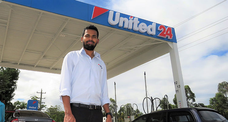 : Employee Martin Routthu at the new United service station in Bulahdelah.  