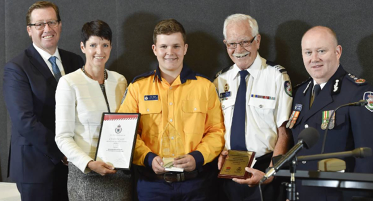 Minister for Emergency Services Troy Grant, Port Stephens MP Kate Washington, Young Volunteer of the Year Alexander Slade, Williamtown-Salt Ash Brigade captain David Thomas, and NSW RFS commissioner Shane Fitzsimmons.