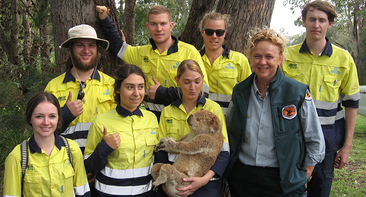 Kathy Ball from the NPWS with Green Army volunteers (and friend) at Tanilba Bay School. 
