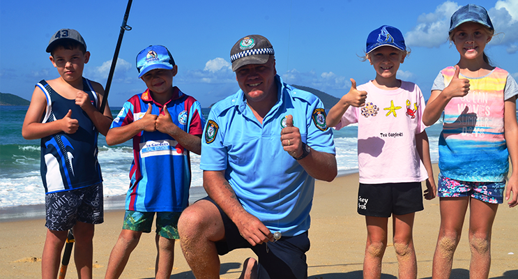 FISHING DAY:  Karuah Police Constable Trent Moffat gets the thumbs up. 