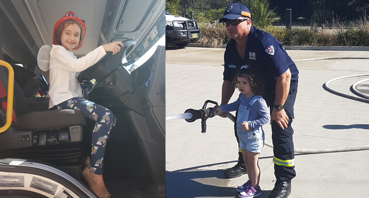 Sienna, age six, at the wheel. Photos by Sarah Stokes (left) Ava, age two, with firefighter Shaun. Photos by Sarah Stokes (right)