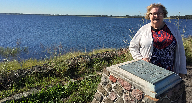 Gwen Tinsley Faulkner at Grahamstown Dam, overlooking her old family property. 
