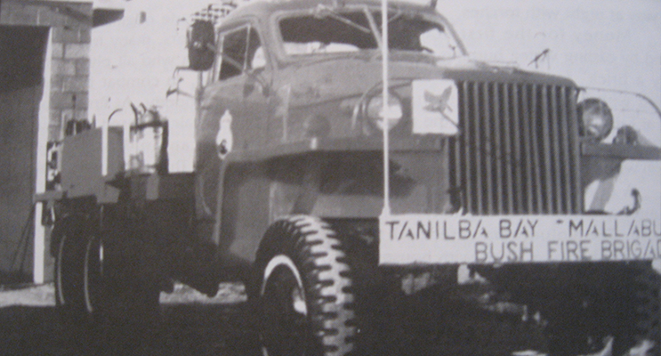 An early photo of a Tanilba tanker beside the original station