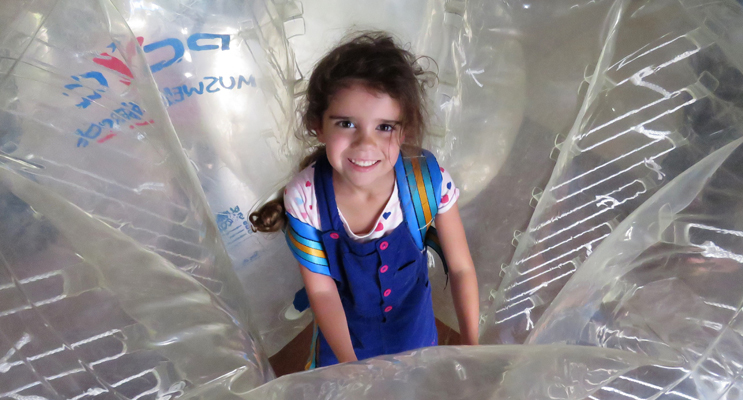 Five-year-old Abbiegail Ray said she loved rolling around in the giant bubbles.