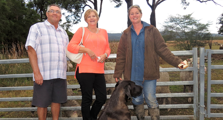 Jim and Kay Levey from Tea Gardens with Julie Steepe and Sarge the dog at Lucy Land Merino Farm. 