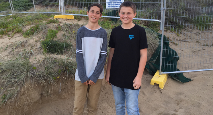 Samuel Finn and Jackson Warburton in front of the new Lifeguard Facility site.  Photos by Jo Finn