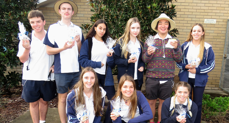  Act Of Kindness: Year 12 students deliver a message of thanks to the community.  
