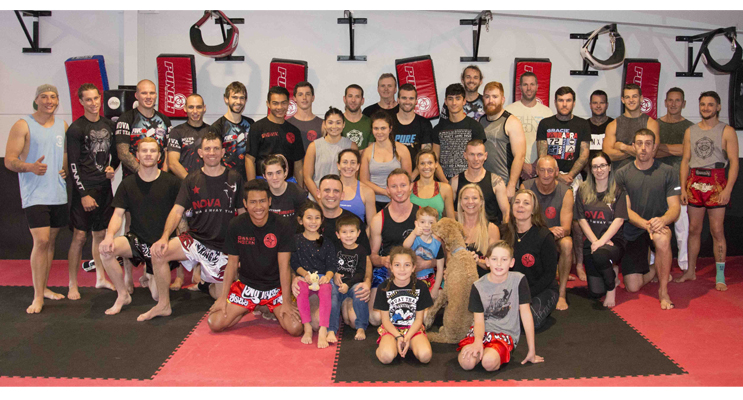 Group photo of attendees at the Muay Thai seminar held at PT Fitness, Taylors Beach.  Photo by Square Shoe Photography