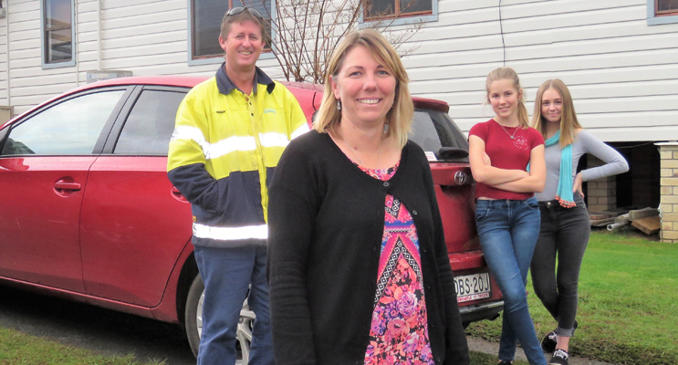 Average Australian: Melissa Smith with her husband Craig, two children, Olivia and Taylah at their three-bedroom home. 