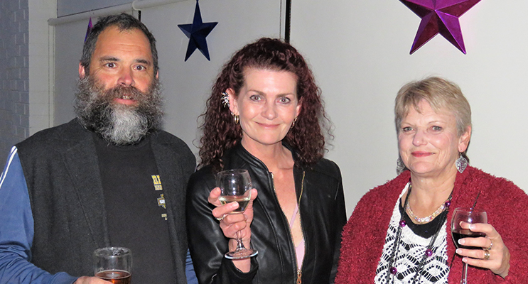 Christmas in July: Henry and Kathy Johns with Penny Bonner.