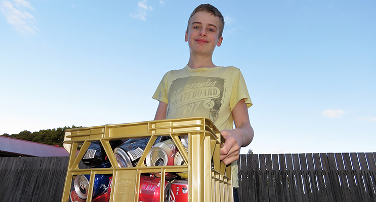 Collecting aluminum cans provides some extra pocket money for Jack Cunich.