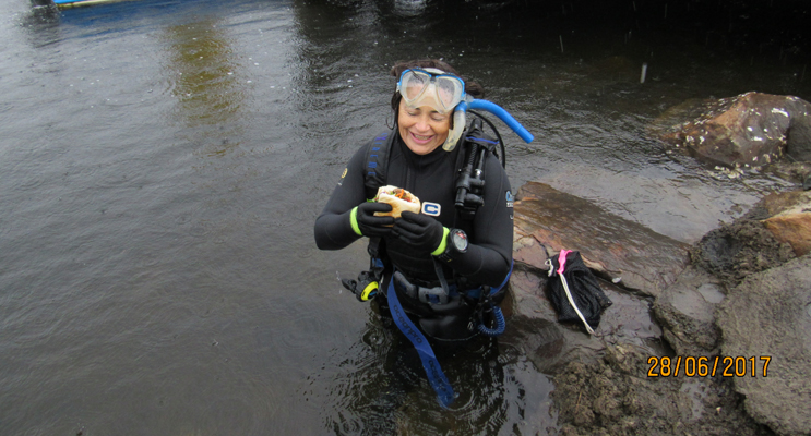 RIVER DINING: Clean-Up Diver Suzanne Fieberg.