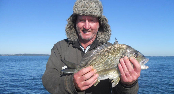 Seeing is believing – Dave Hoyle with his 40cm bream and Ron Gunness with his catch.  