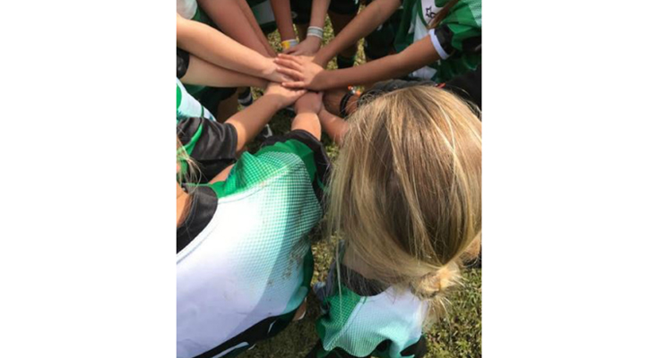 Hands in, ready to play.