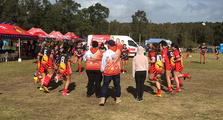 Awabakal warming up at the Rugby League.
