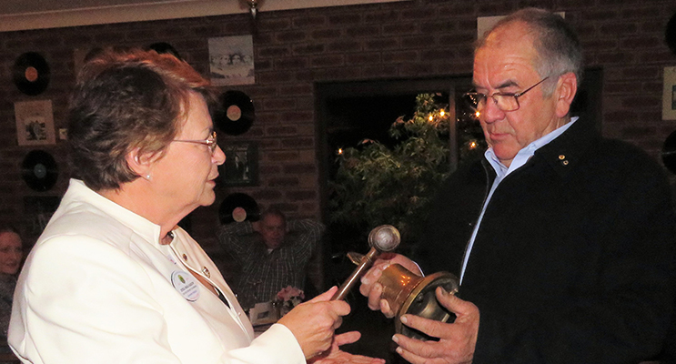 Gong and Gavel: District chairperson Inga Kasch and new President Arthur Baker. 