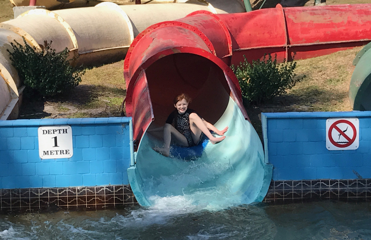 KARUAH PRIMARY ADVENTURE: Jessica on the water slide.