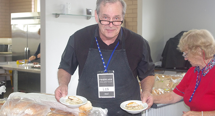 Retired Chef Les White serving up hot meals to all who come through in winter.  Photo by Marian Sampson