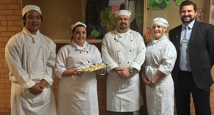 Irrawang High students catered to the VIP guests with handmade delicious creations: Grant Bernardo, Ashley Pearson, teacher Chris Enright, Chloe Lambert and principal Paul Baxter. 