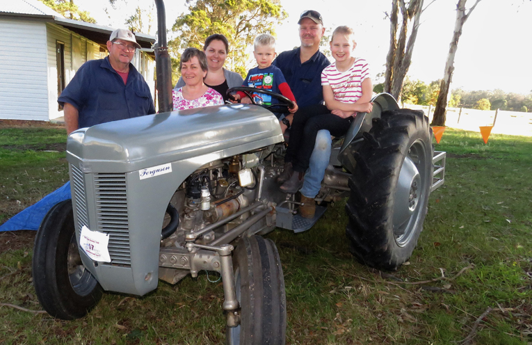 Merv and Sarah Turner with Emily, Darcy, Ben and Charlee Morgan and their 1948 TE20 Ferguson Tractor. 