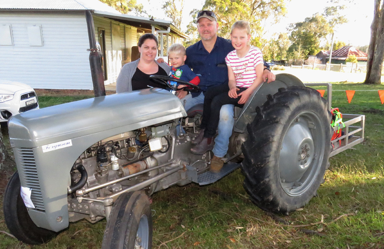 Emily, Darcy, Ben and Charlee Morgan with their 1948 TE20 Ferguson Tractor, named Charlee.
