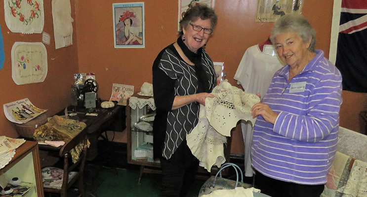 Diane Burns and Irene Worth in the sewing corner at the Courthouse Museum.  