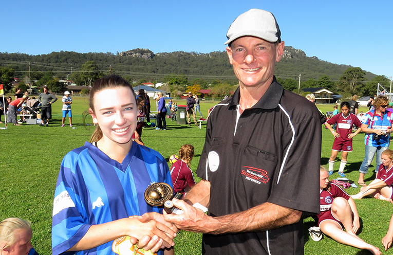 Player Of The Match: Chloe Lamborn receives her award from Dave Sibert. 