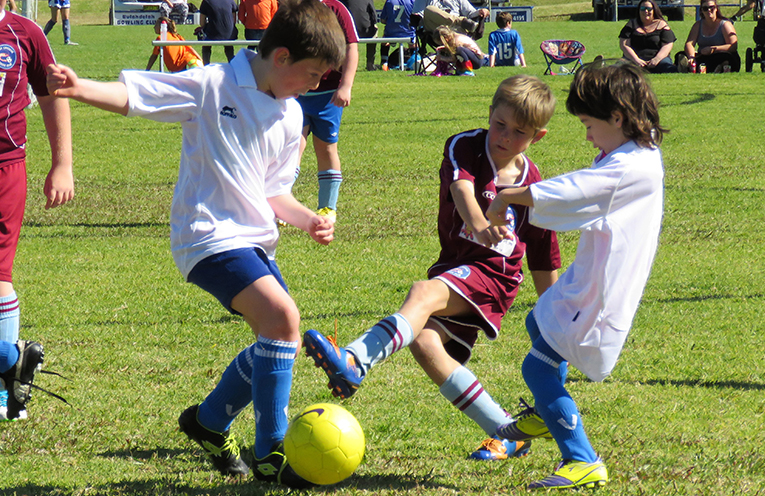 Stepping Up: Junior players show their skills on the field. 