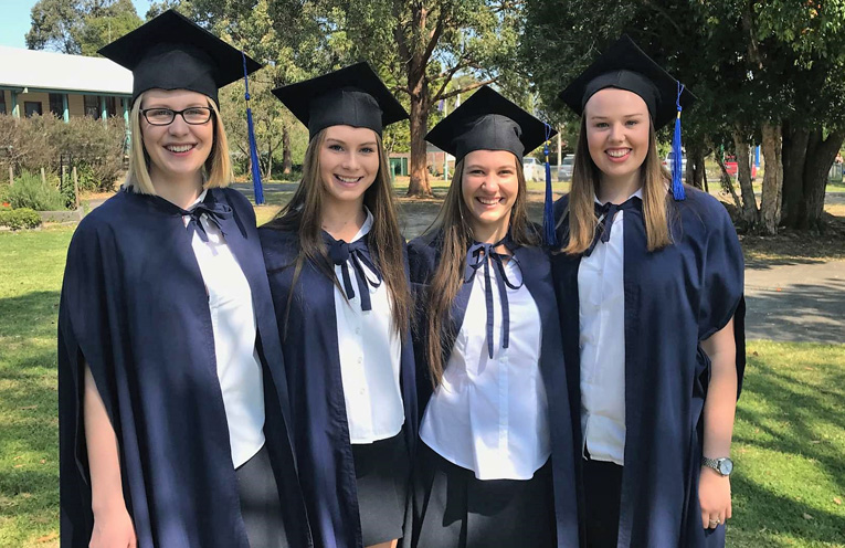 Graduation Day: Kaitlyn Gregory, Bianca Mason, Tamara Gooch and Shae Finch.
