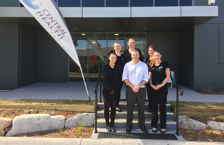 Trainee Receptionist Gabby Verschelden, Head Nurse Bec Verschelden, Nurse Dot Poulter, Trainee Receptionist Sam Almond, Dr Paul Burford and Practice Manager Rachel Peake at the opening to the new building. 