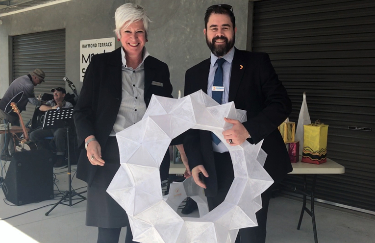 Penny Amberg, Council's Integrated Strategic Planning Manager, at the festival launch with Greater Bank’s Chris Baguley receiving a sponsorship lantern hanging which is now hanging in one of the Port Stephens Greater Bank Branches.