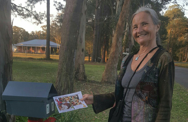 Julie Hawkins, delivering flyers to residents.
