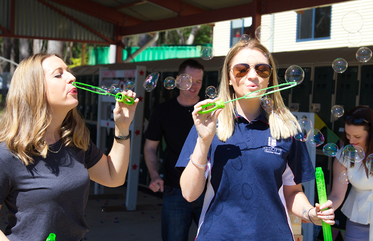 Petting the baby animals from Oakvale farm. Photo by Pete Neville