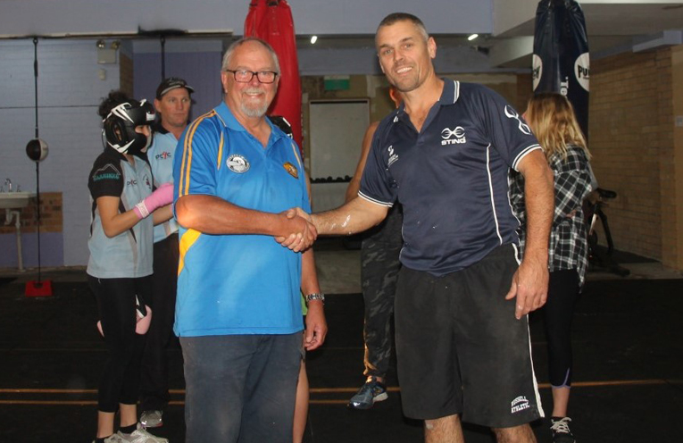 PCYC DONATION: Ulysses Club President David Cant with PCYC’s Senior Constable Rob Wylie.