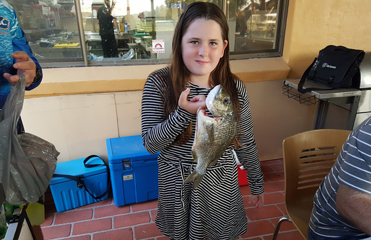 Poppy Rapley with her bream.