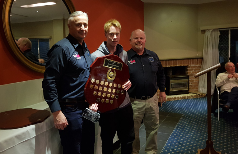 COACHES AWARD: Coach Russell Gunn, Karl Nickle and President David Bright.