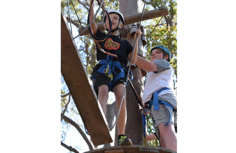 Jimmy Pitcher and Joshua Guthrie exploring the high ropes.